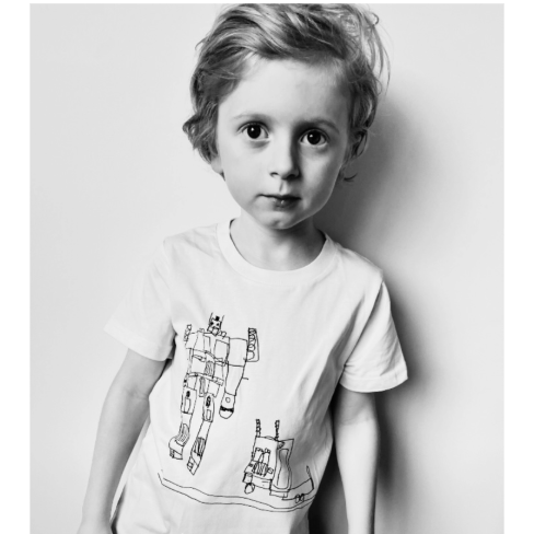 Bodhi, wearing a t-shirt he designed.