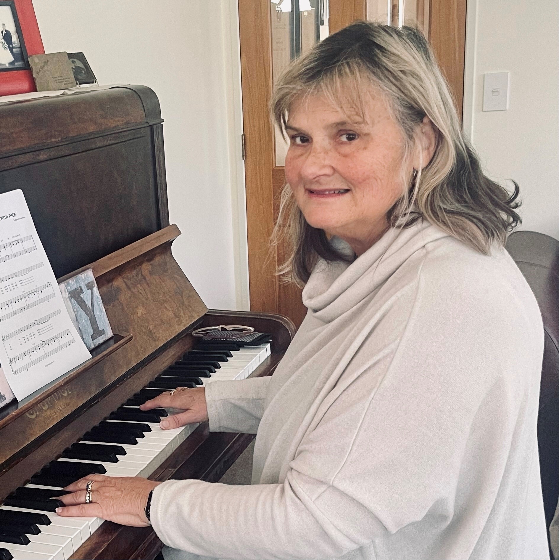 Raewyn at the piano.