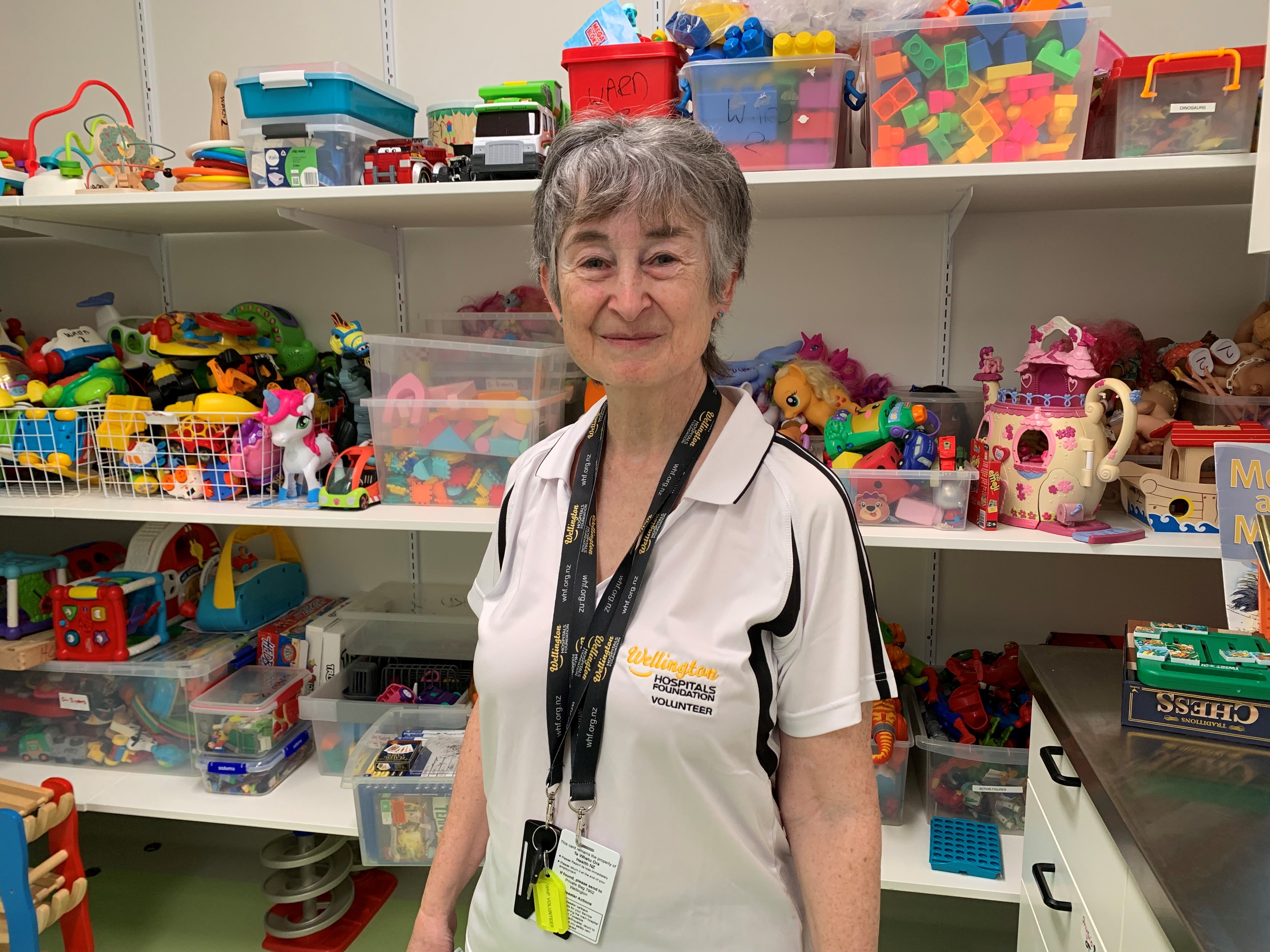 Carol, children's hospital volunteer in toy room