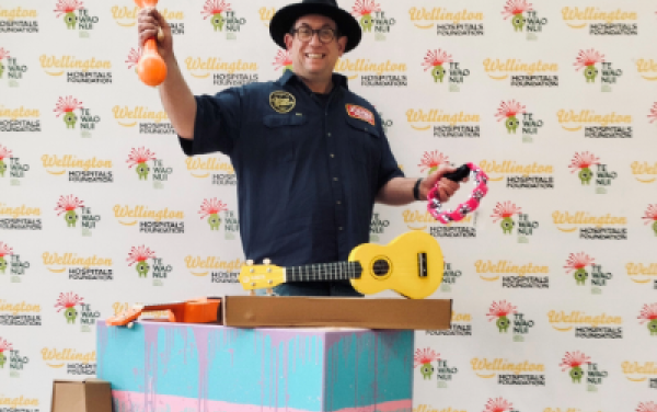 Justin with various musical instruments