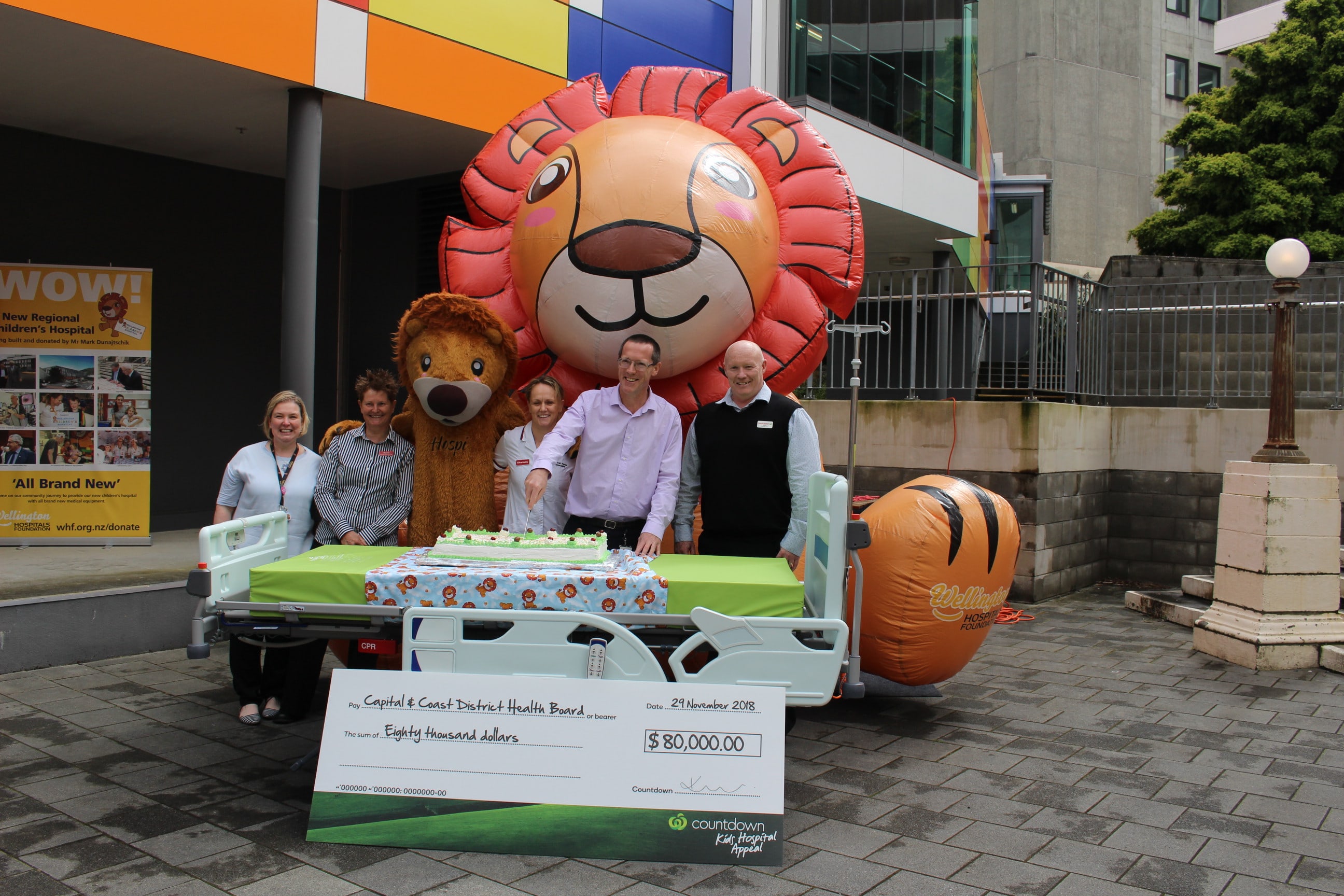 Children's Hospital staff with a sample of one of the new beds!