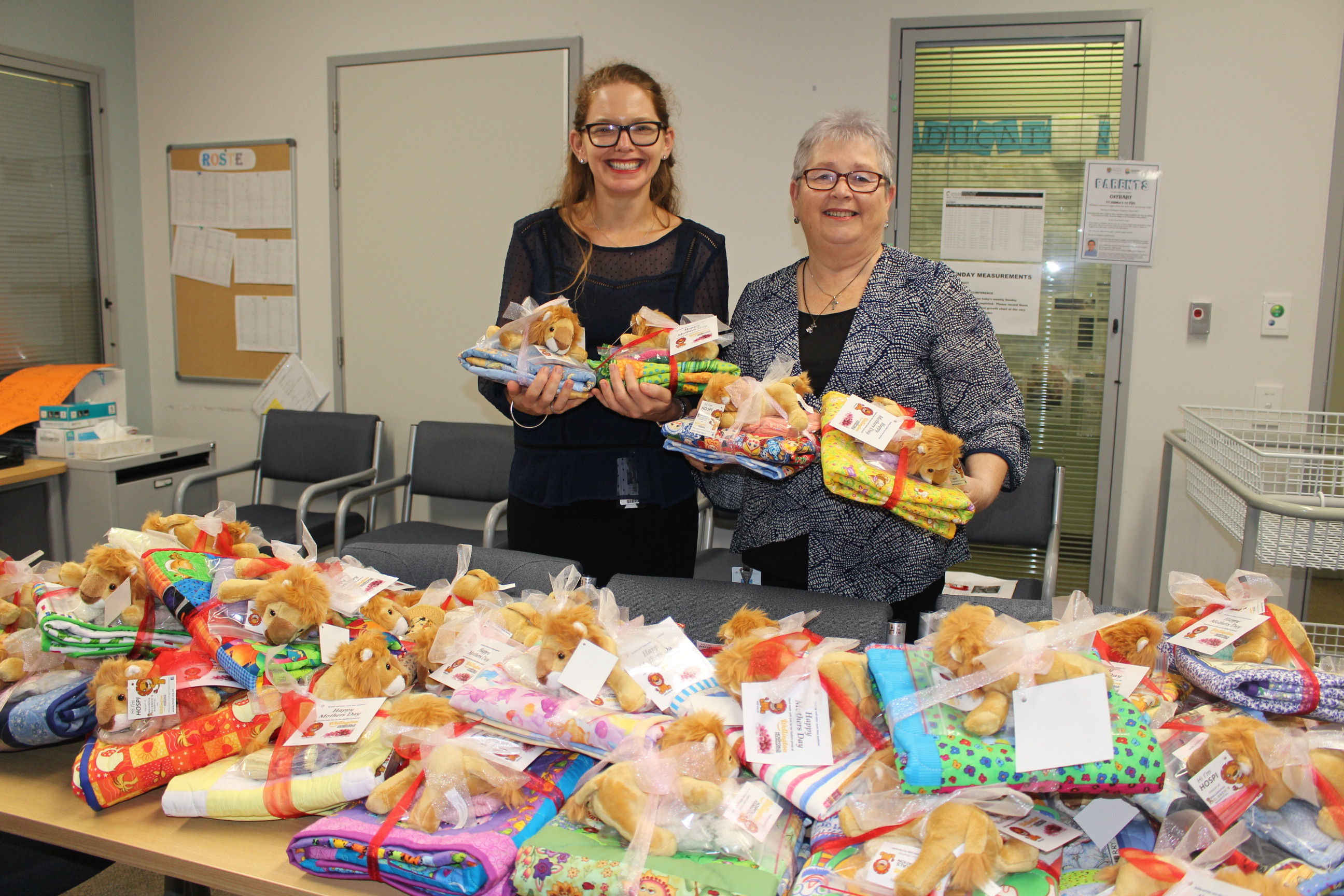 Deb Davenport (Acting Charge Nurse Manager at Wellington Neonatal Intensive Care Unit) with Trish Lee (Volunteer Manager at Wellington Hospitals Foundation) with the Mother’s Day gift packs.