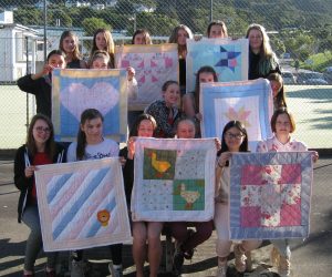 The Textile Design Class at Onslow College with their handmade quilts for new mums. 