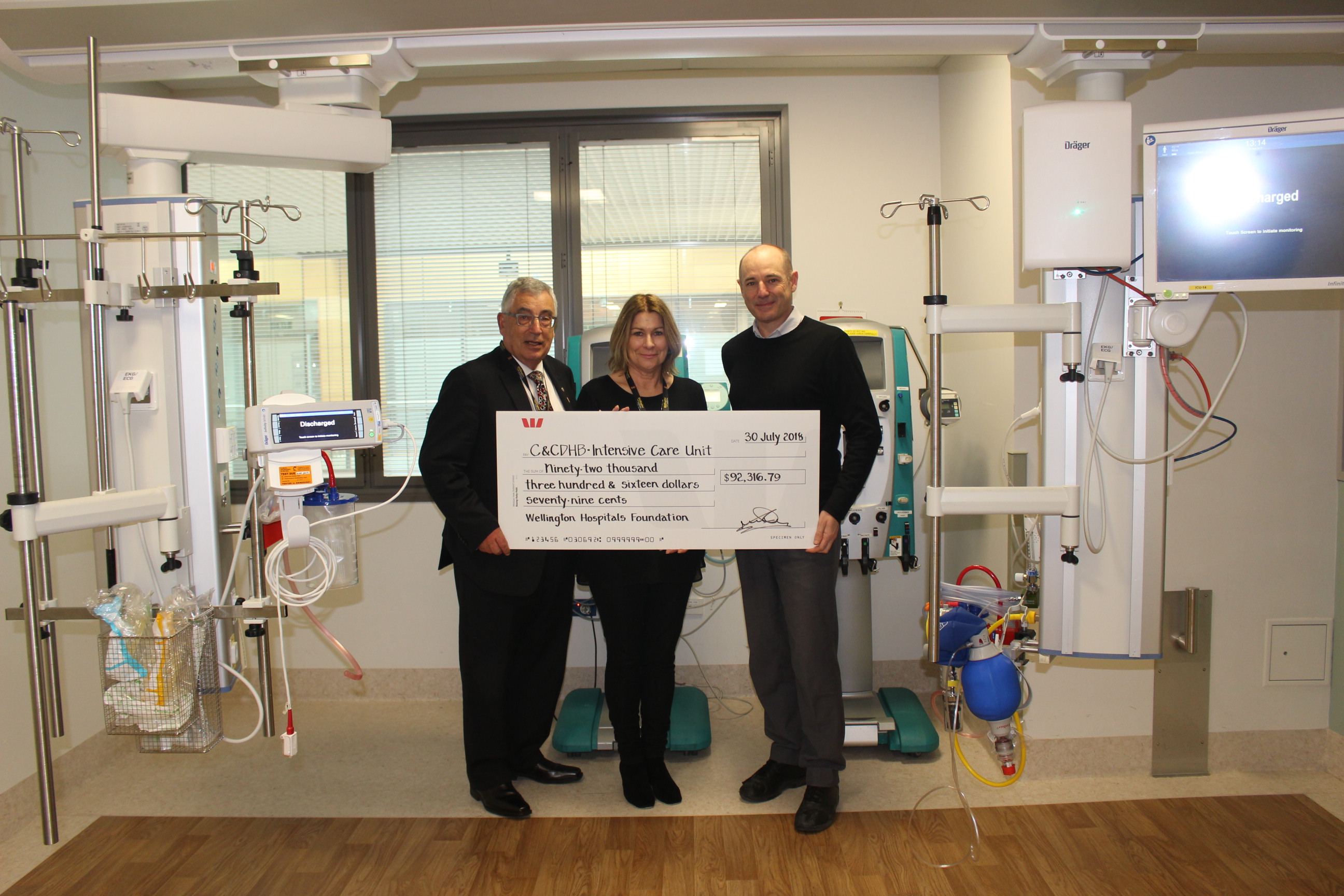 Bill Day (Chair of the Foundation), with Shona, and ICU Charge Nurse Manager Stephen James