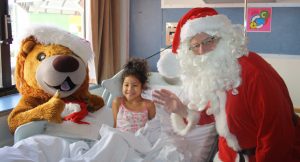 Wellington Children's Hospital patient Armani with Santa and Hospi